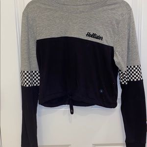 long sleeve cropped shirt.